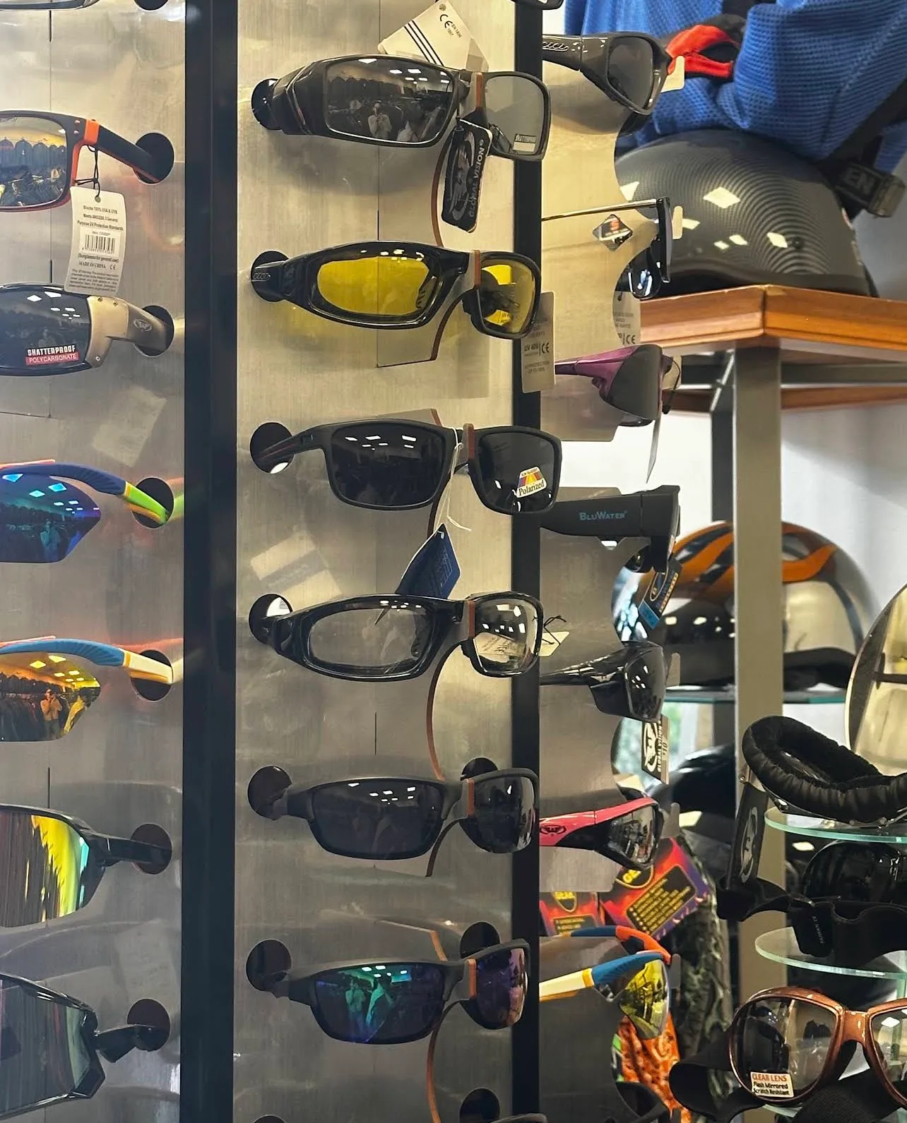 Riding sunglasses and goggles display at Hasbro Leather