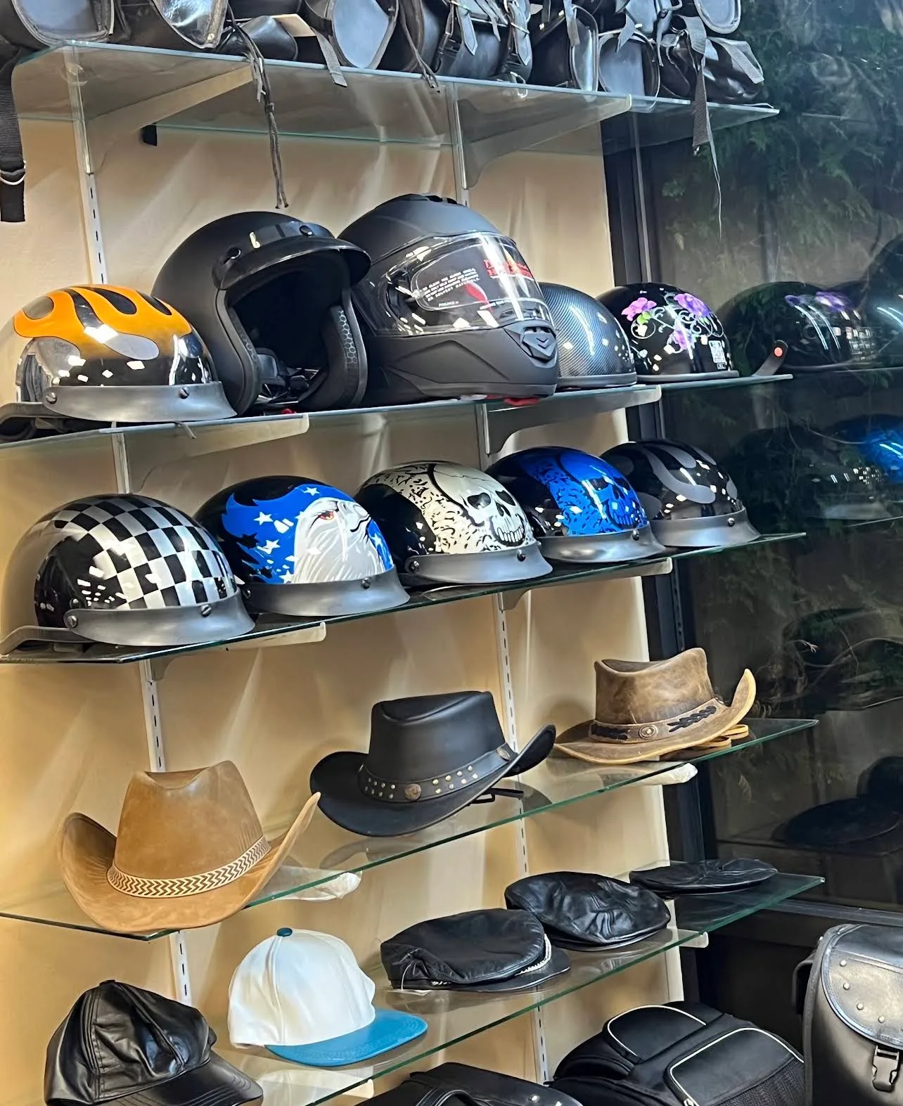 Motorcycle helmets and leather hats display at Hasbro Leather
